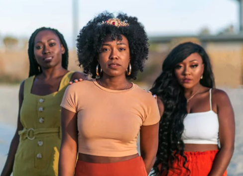Three Black women standing together