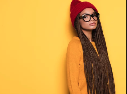 Black woman against a yellow background