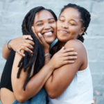 happy women hugging