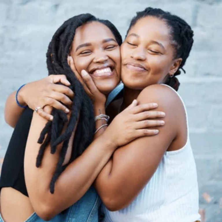happy women hugging